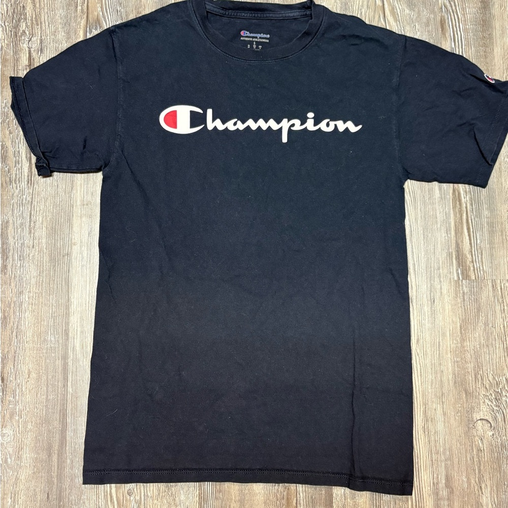 Champion Black Short Sleeve Tee with White Script Logo and Red Accent